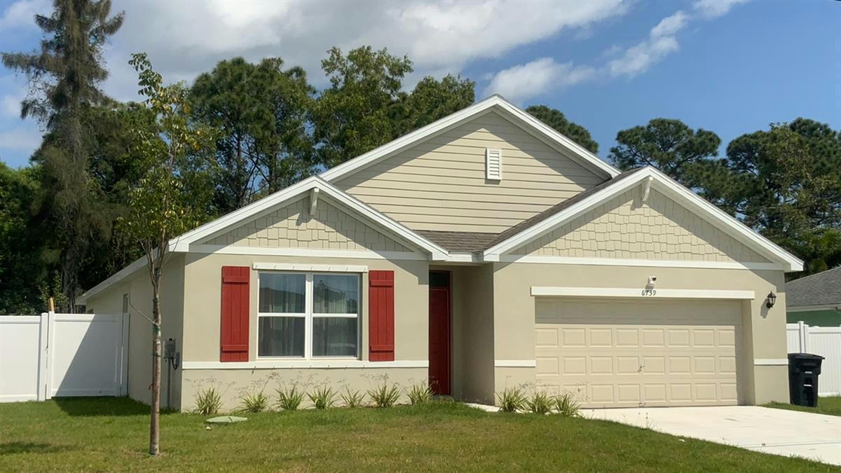 6739 NW OMEGA RD, PORT SAINT LUCIE, FL 34983, photo 1 of 36