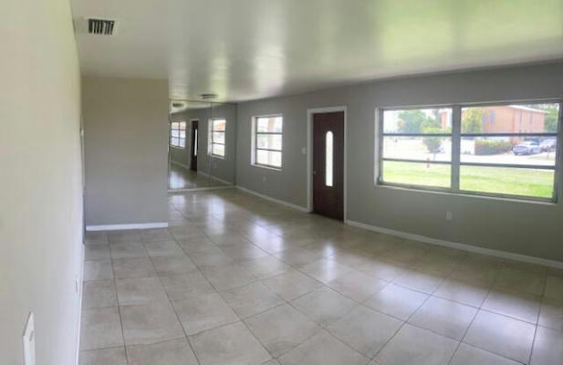 604 SW 13TH ST, BELLE GLADE, FL 33430, photo 2 of 11