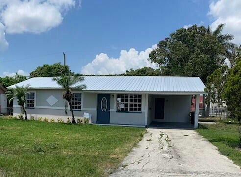 764 SW 10TH ST, BELLE GLADE, FL 33430, photo 1 of 12