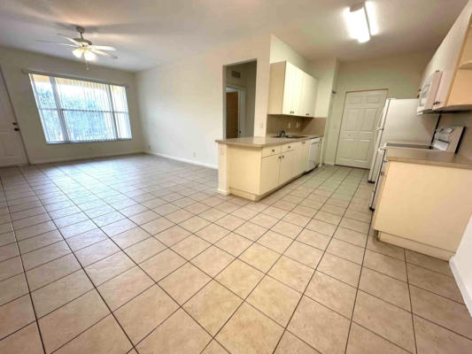 3569 FOREST HILL BLVD APT 100, PALM SPRINGS, FL 33406, photo 2 of 15