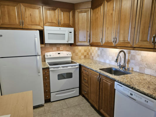 700 VILLAGE GREEN CT APT H303, PALM SPRINGS, FL 33461 - Image 1