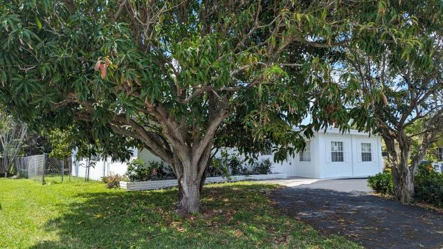 426 BAYBERRY DR, LAKE PARK, FL 33403, photo 2 of 13