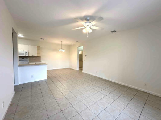 3569 FOREST HILL BLVD APT 100, PALM SPRINGS, FL 33406, photo 3 of 15