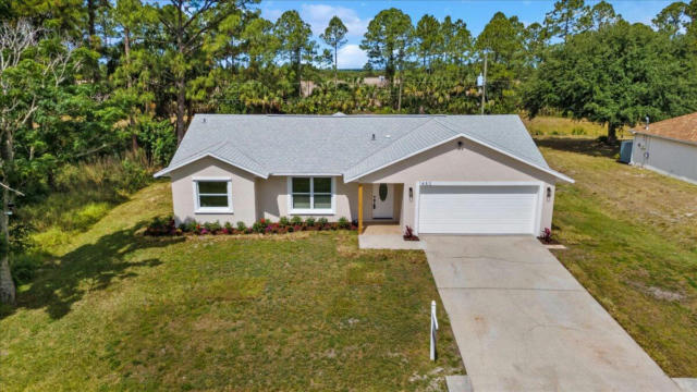 1450 AMADOR AVE NW, PALM BAY, FL 32907, photo 4 of 35