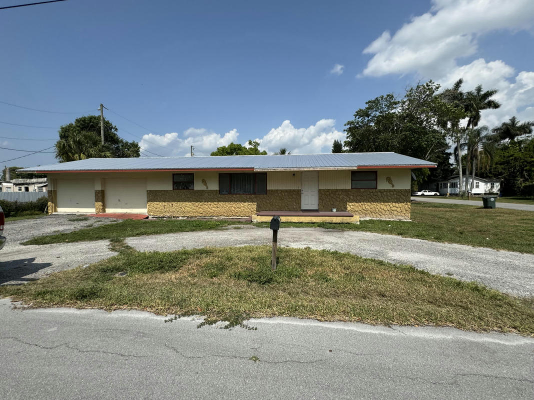 601 NW 7TH ST, BELLE GLADE, FL 33430, photo 1 of 6